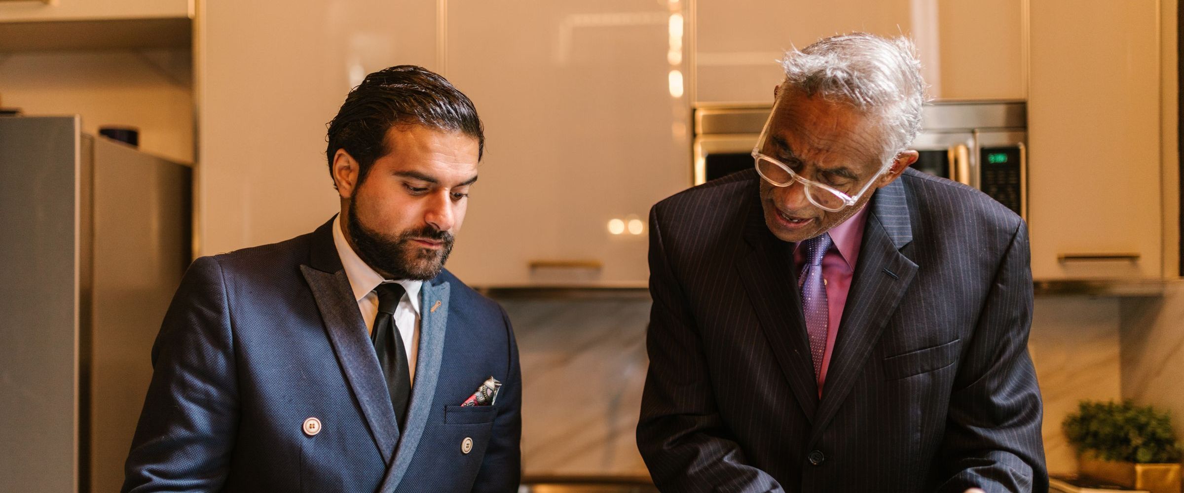 A financial adviser reviewing a plan with an older client